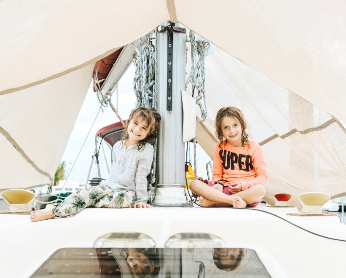 kids on a sailboat